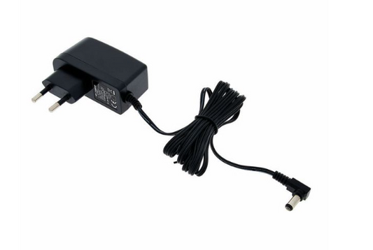 Power NT0985C CASIO 9vDC 1A Neg. i senter =AD5G, AD5ML